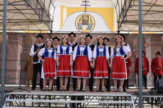 Group of dancers performing traditional Hungarian folk dance in Máriapócs.