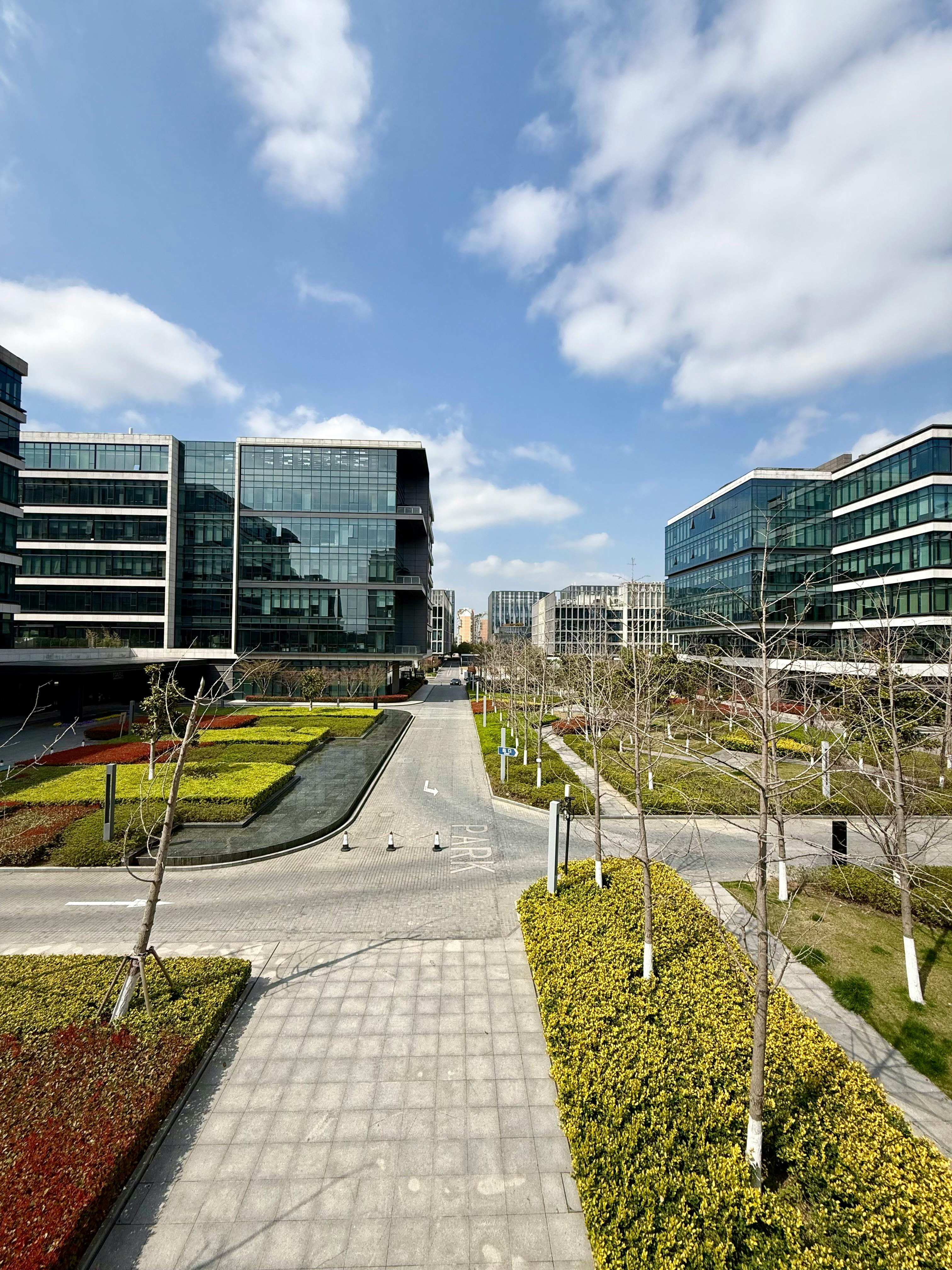 Modern Business Park with Glass Buildings in Spring