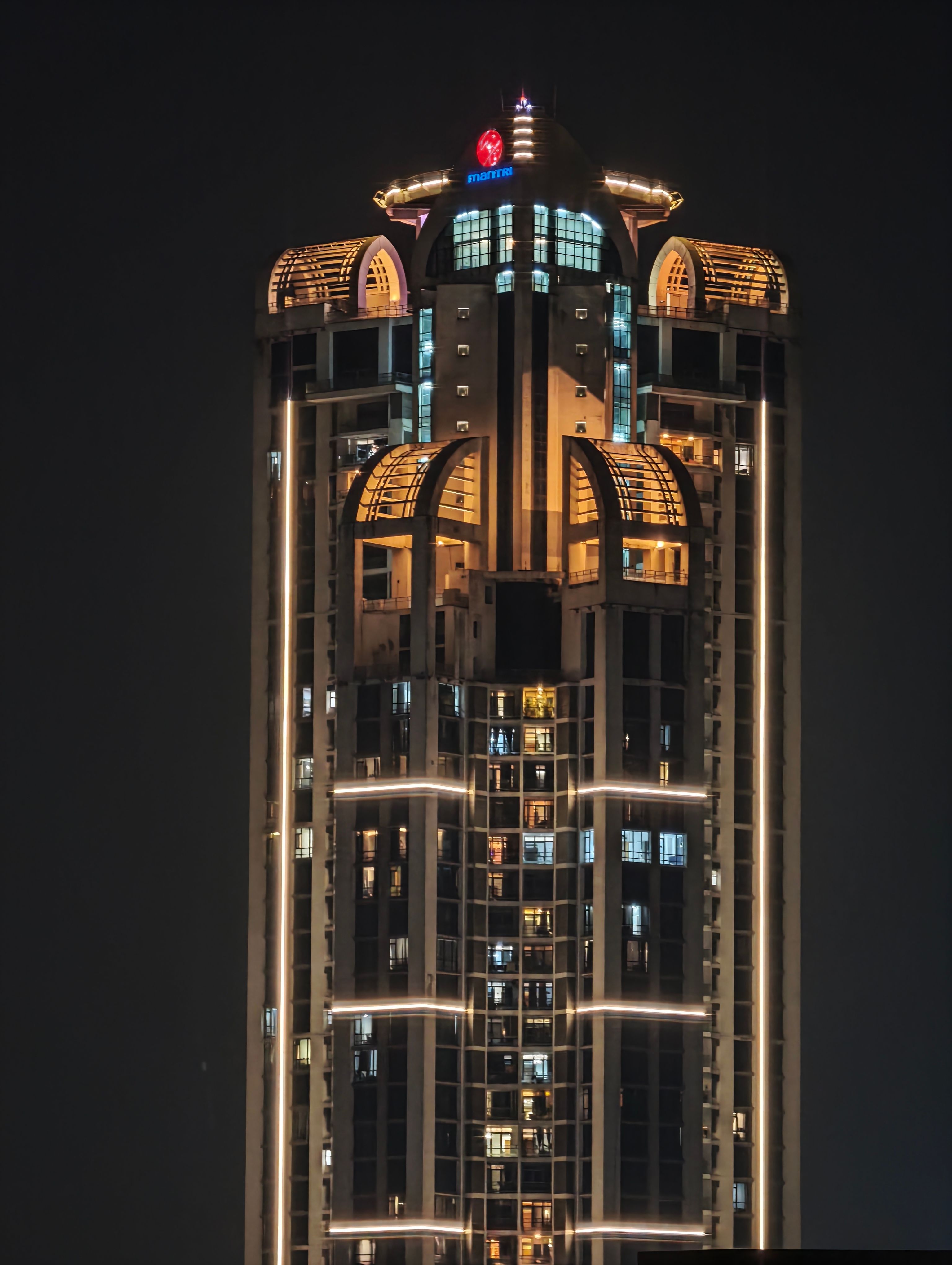 UB Tower in Bengaluru's central business district, illuminated at night