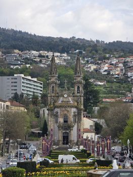 A scenic view of Igreja de São Gualter in Guimarães with surrounding landscape.