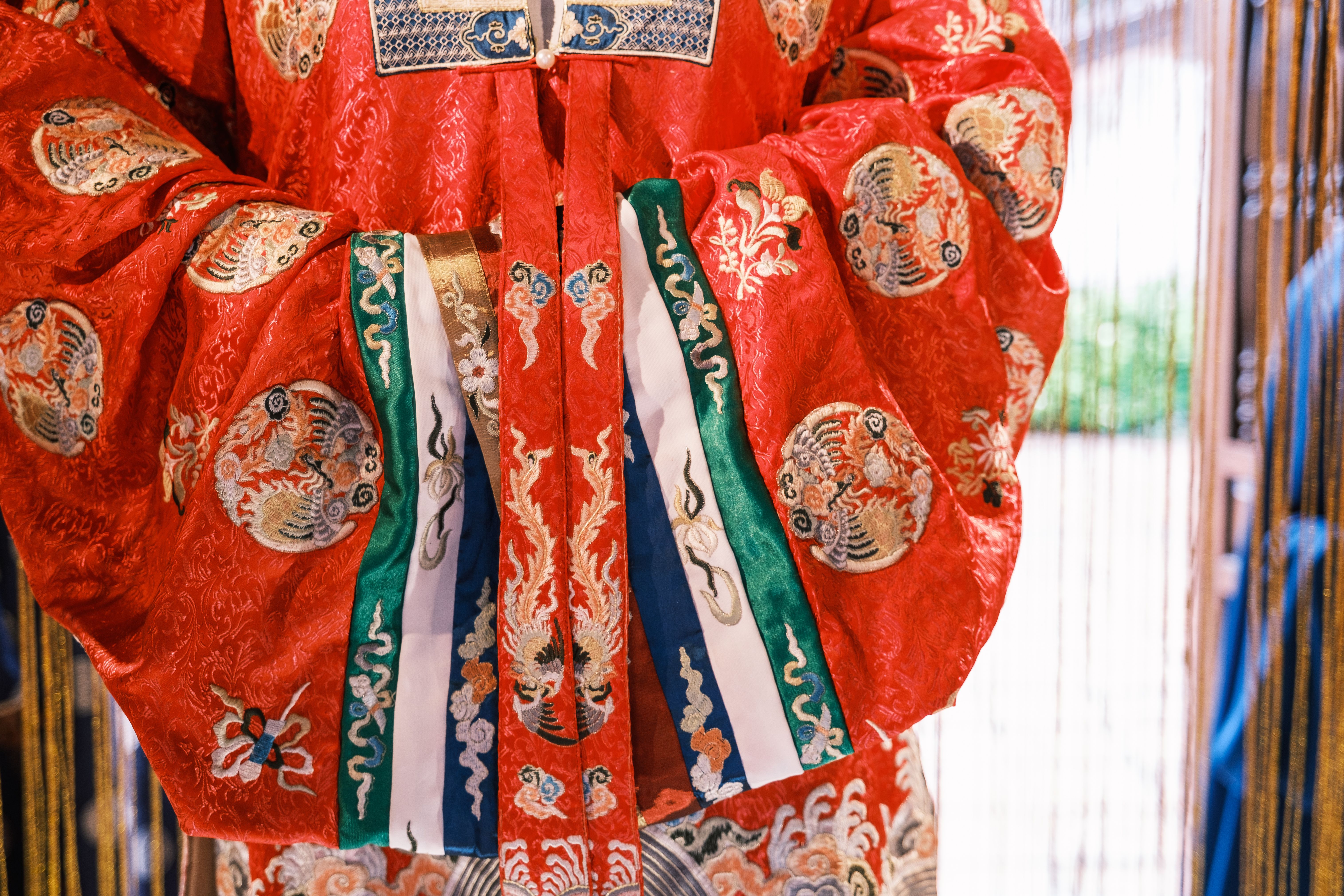 Close up of handcrafted kimono robe embroidery and floral design details