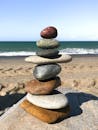 Balanced Stones on a Tranquil Beach
