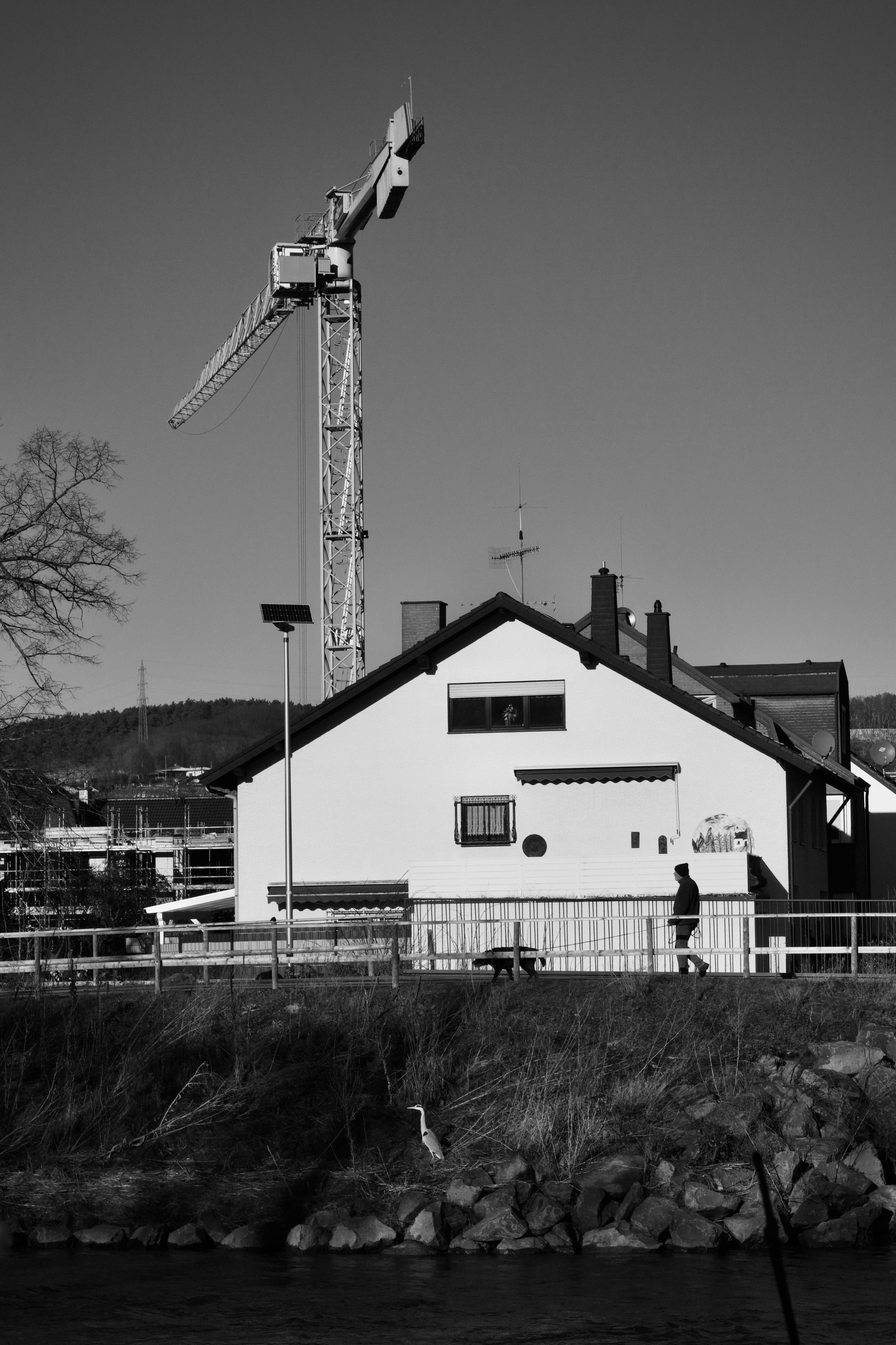 Monochrome Urban Scene with Construction Crane · Free Stock Photo