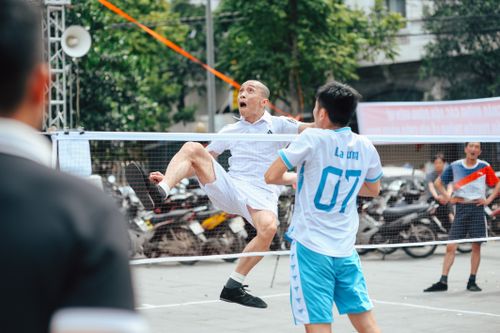 Free Dynamic action shot of a Sepak Takraw game, capturing intense focus and athleticism. Stock Photo