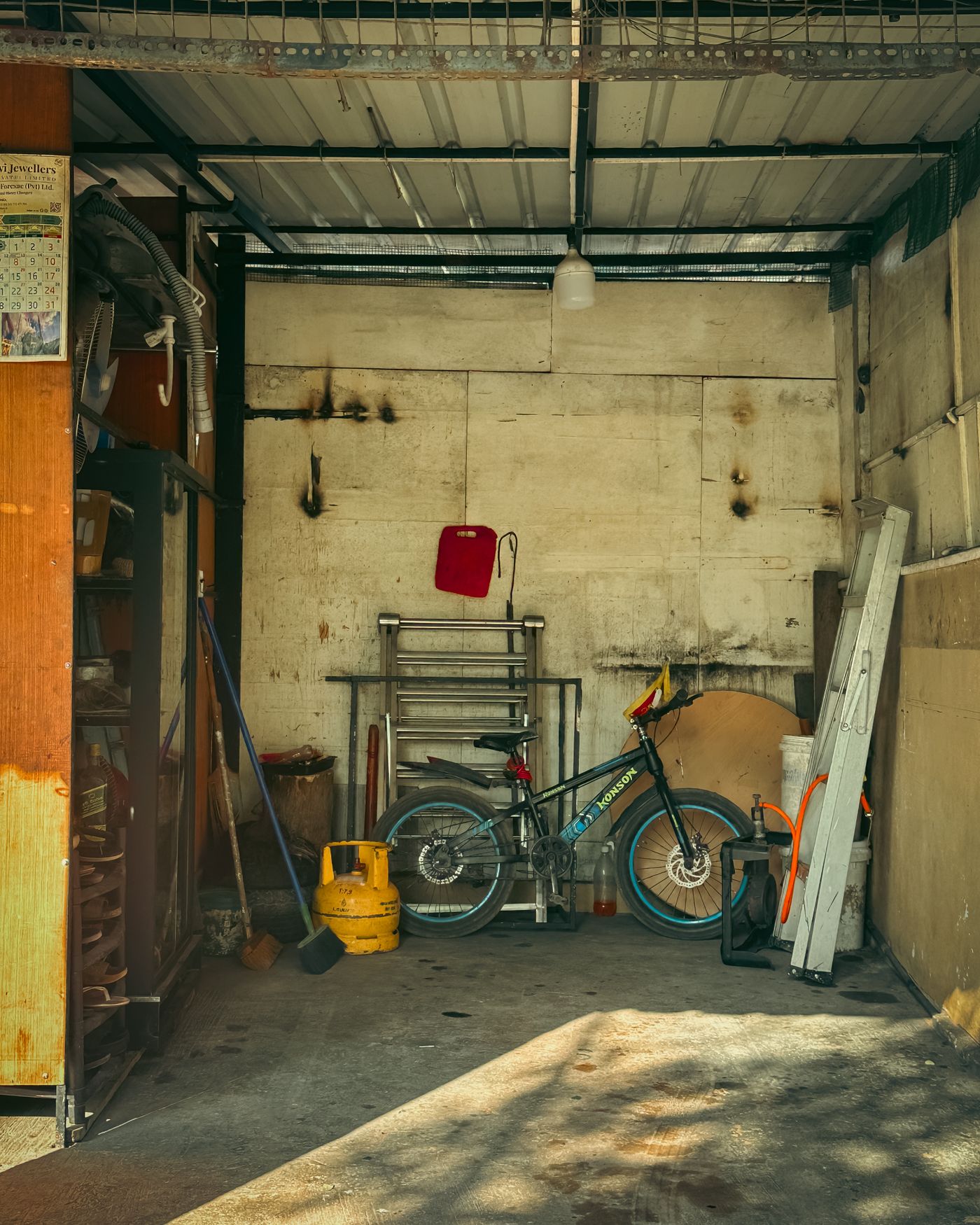Organized garage with bicycle and tools