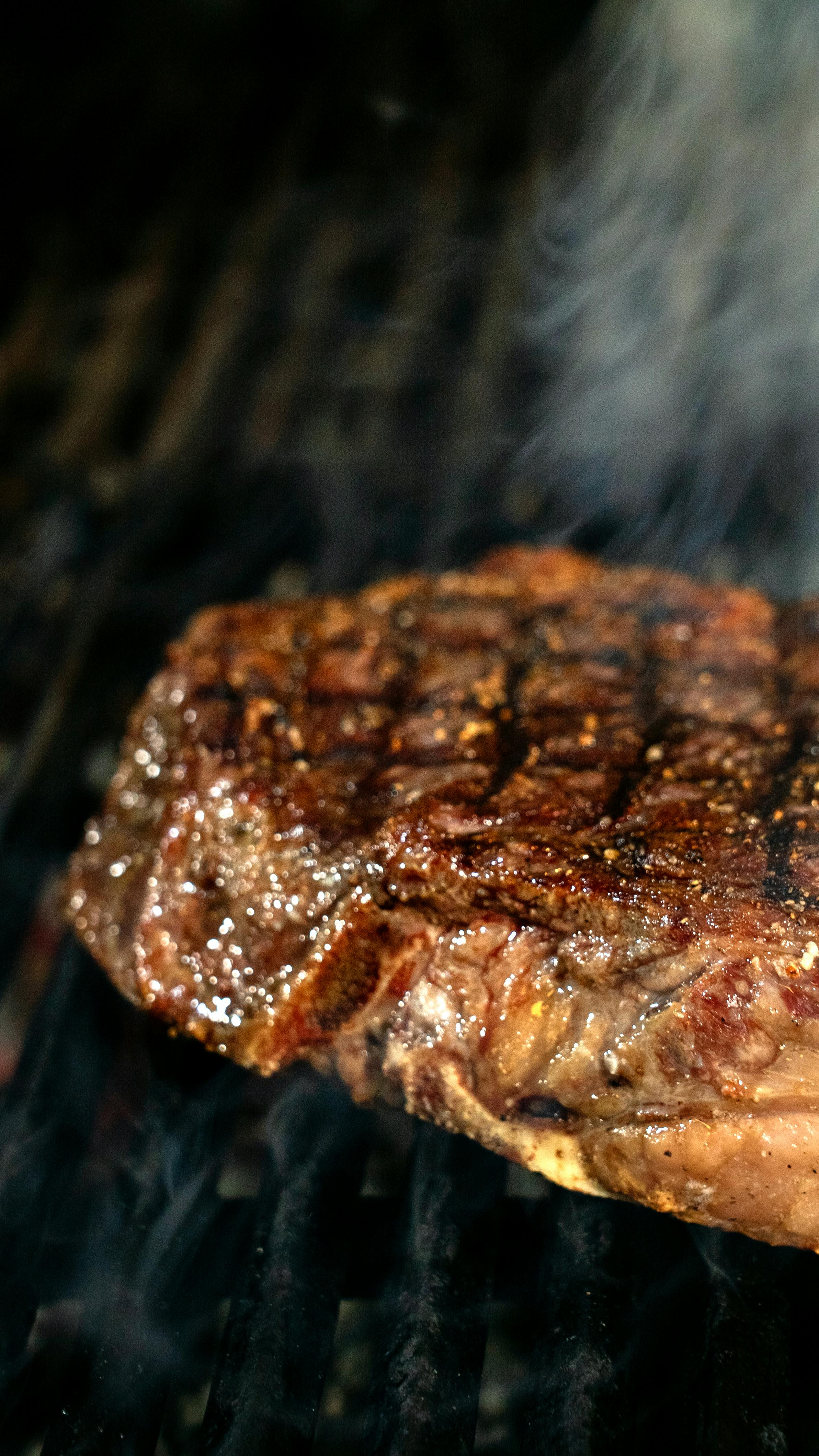 Cross-section of perfectly cooked thick steak showing even doneness