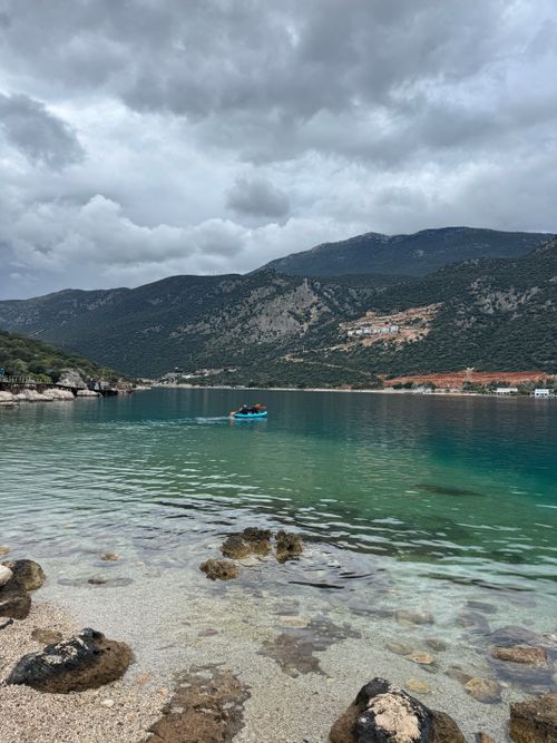 Free Explore the tranquil waters and stunning mountains of the Mediterranean coastline in this scenic view. Stock Photo