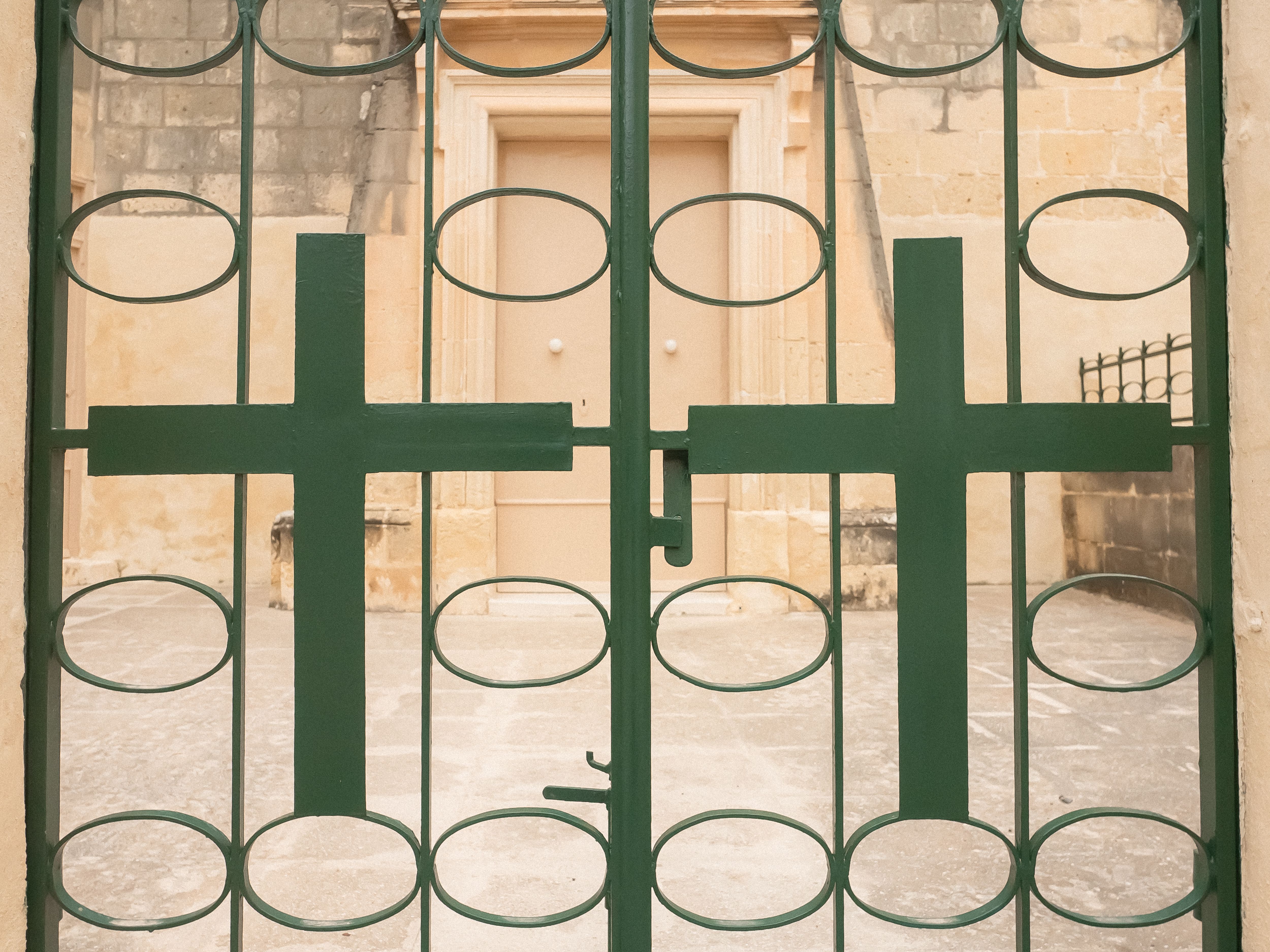 Green Iron Gate with Cross Design · Free Stock Photo