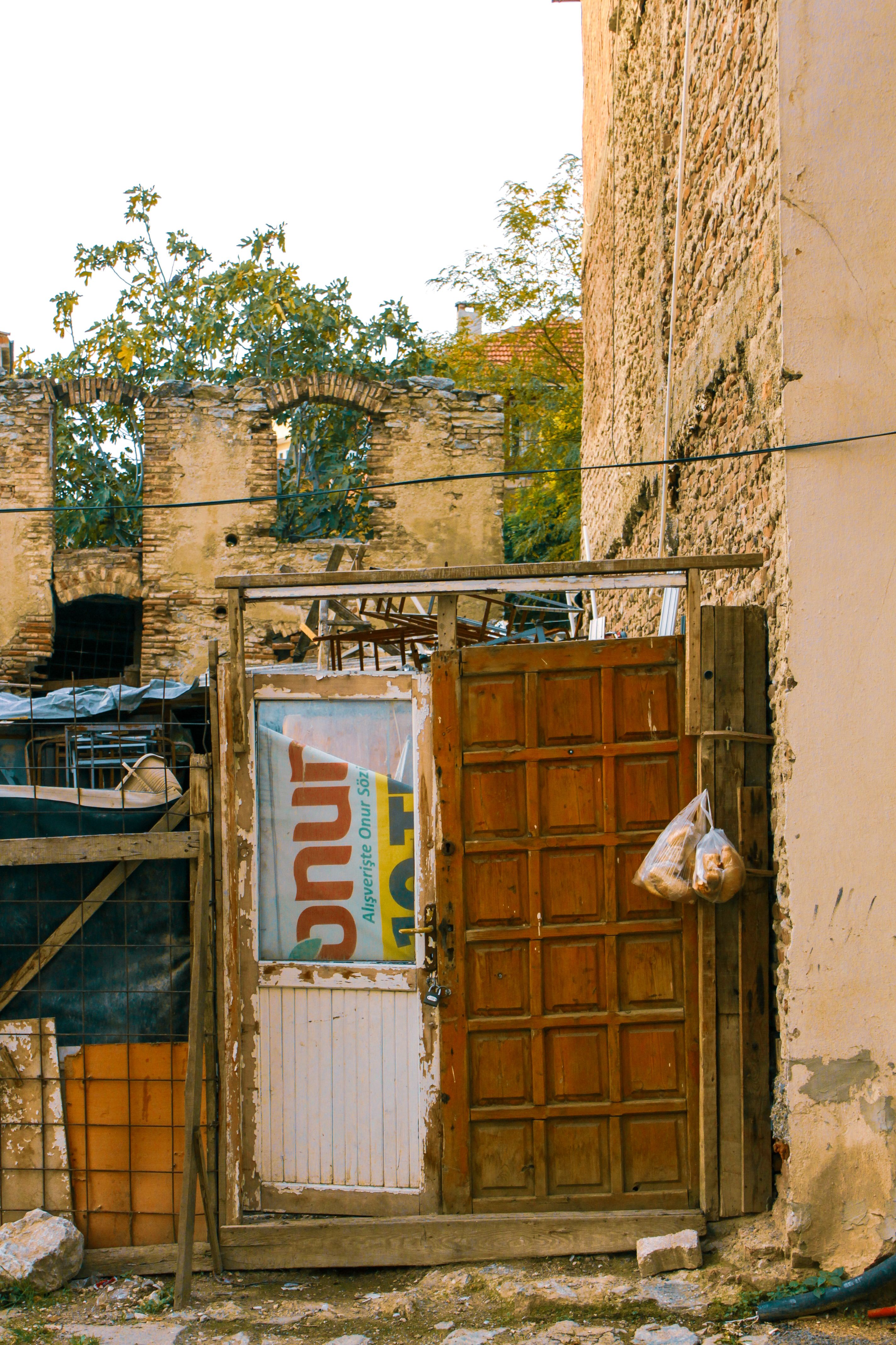 Historic Rustic Street Scene with Old Door · Free Stock Photo