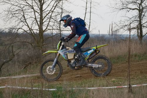 Free A motorcyclist riding an enduro bike on a dirt trail in Jihomoravský Kraj, Czech Republic. Stock Photo