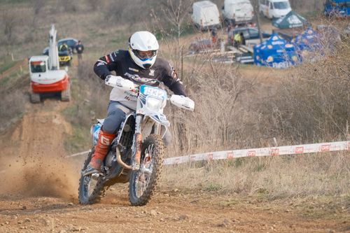 Free Motocross rider racing in a dirt track event in Jihomoravský kraj, Czech Republic. Stock Photo
