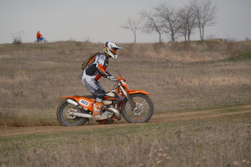 Free Off-road motocross racing in Jihomoravský kraj, capturing the thrill of extreme sports. Stock Photo