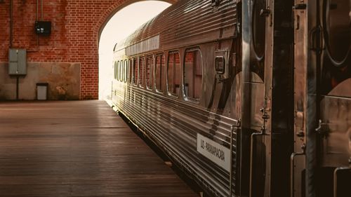 Free Classic train emerging from Paranapiacaba station tunnel, São Paulo, Brazil, showcasing historic charm. Stock Photo