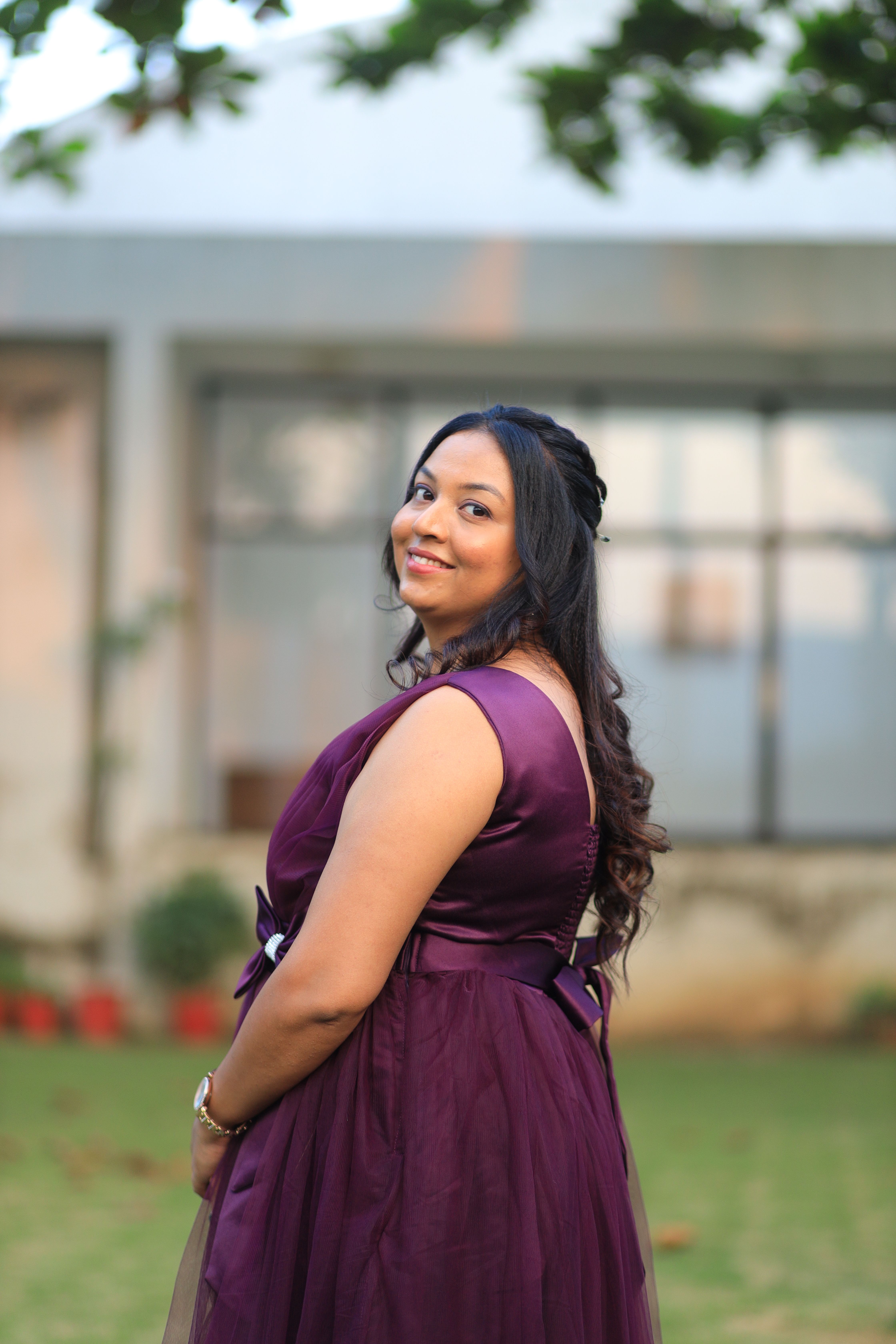 Elegant Woman in Purple Dress Outdoors · Free Stock Photo