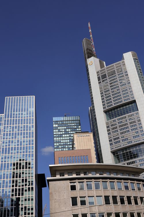 Free Modern skyscrapers under a clear blue sky in Frankfurt's financial district, Hessen. Stock Photo