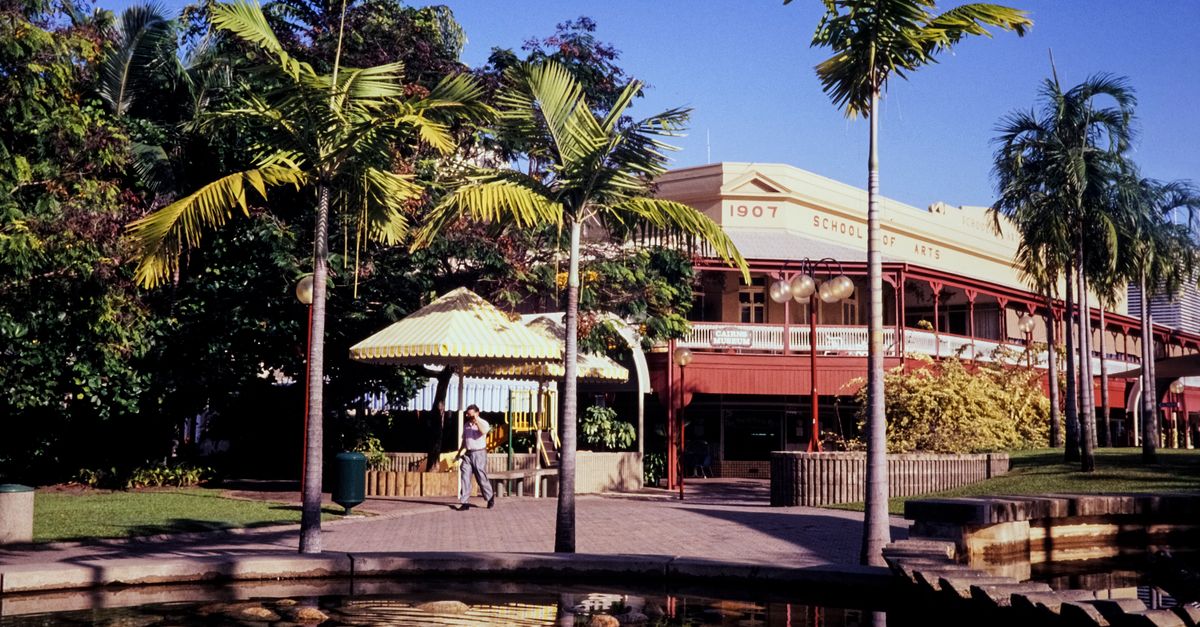 The 1907 School of Arts building with palm trees in Cairns, Queensland, Australia.