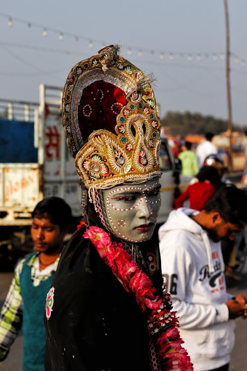 Free Ethnic man in colorful carnival clothes Stock Photo