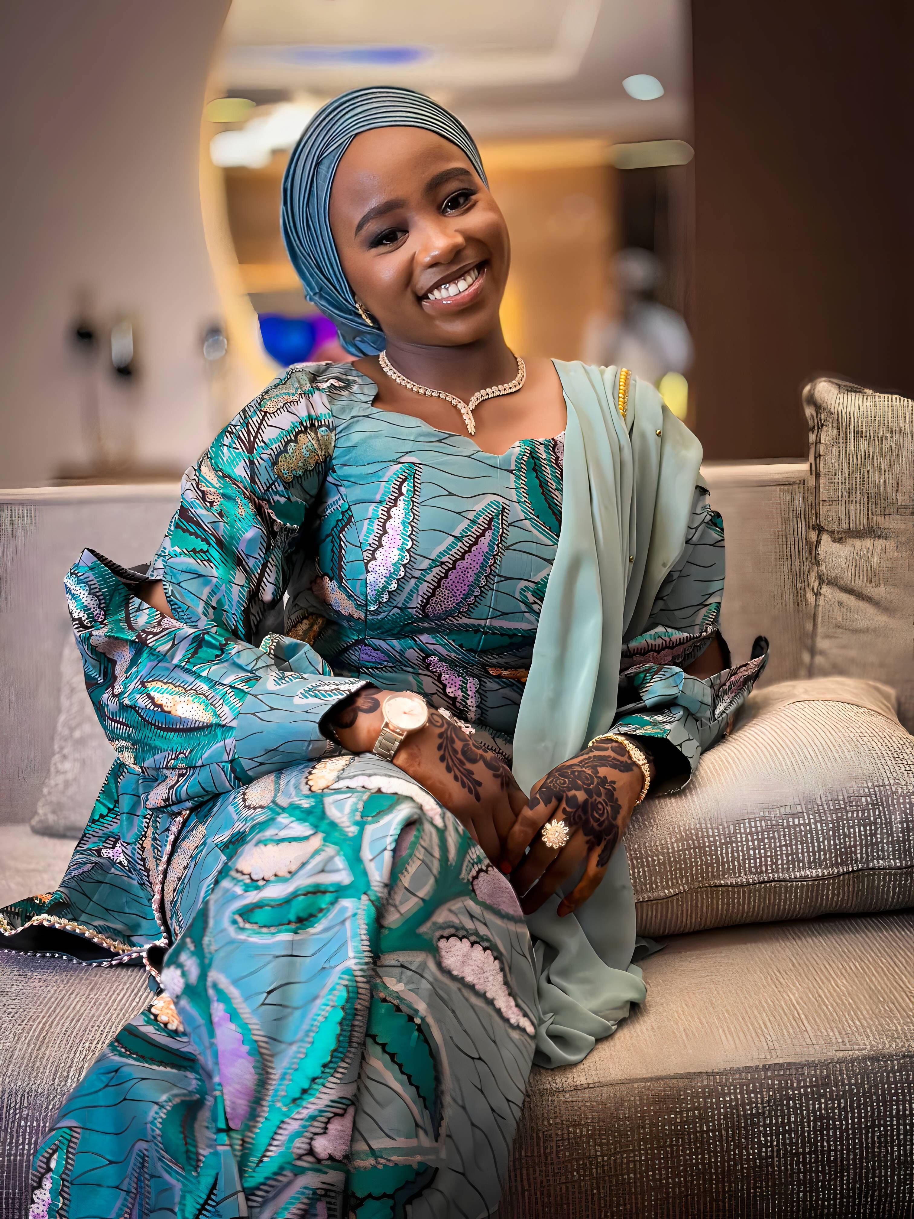Elegant Woman in Traditional African Attire Smiling · Free Stock Photo