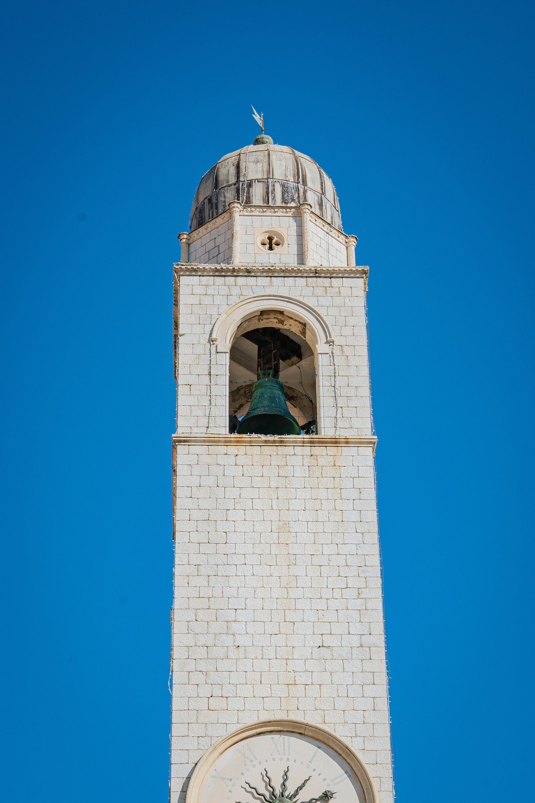 Historic Bell Tower Against Clear Blue Sky · Free Stock Photo