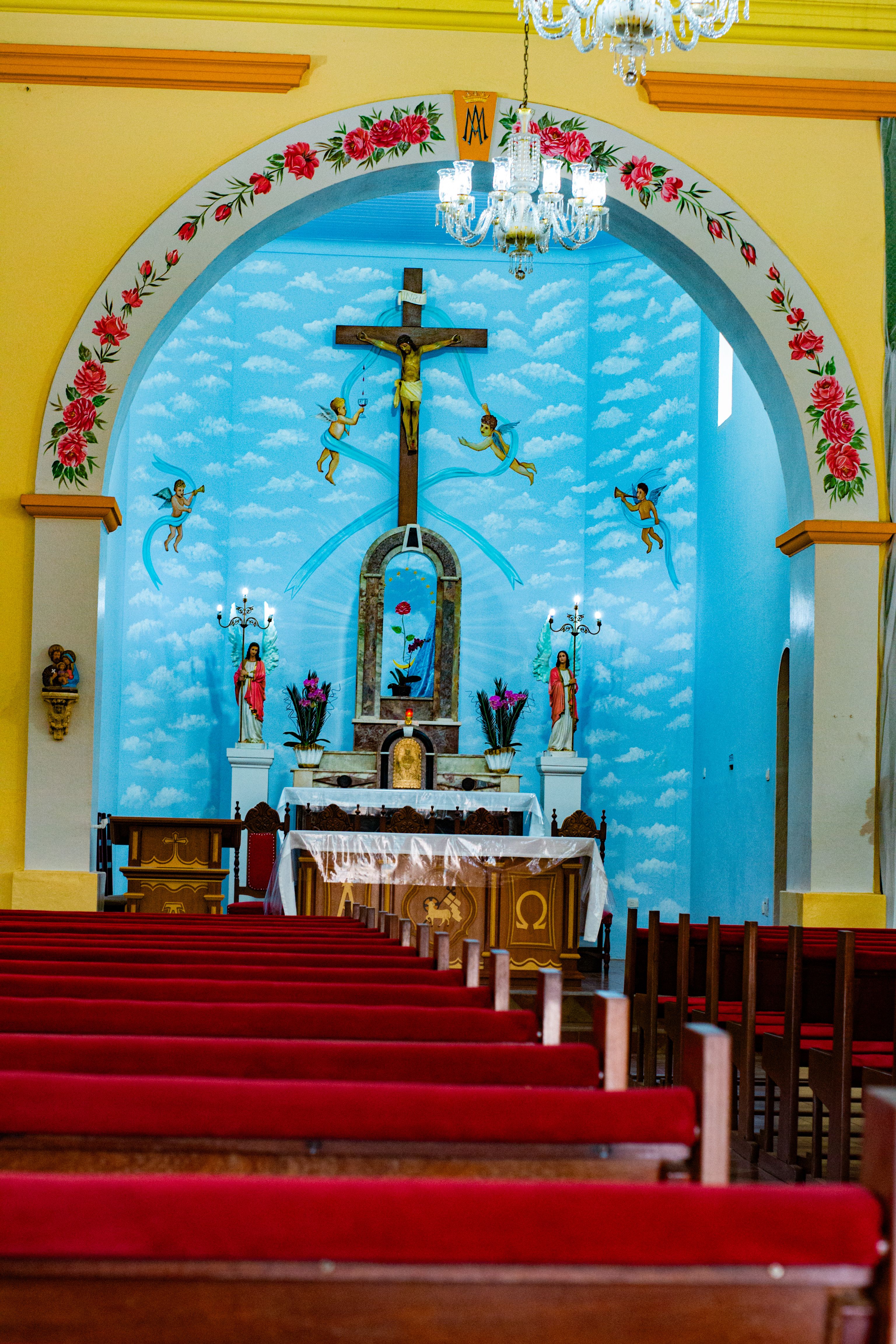 Colorful Church Interior with Altar and Crucifix · Free Stock Photo