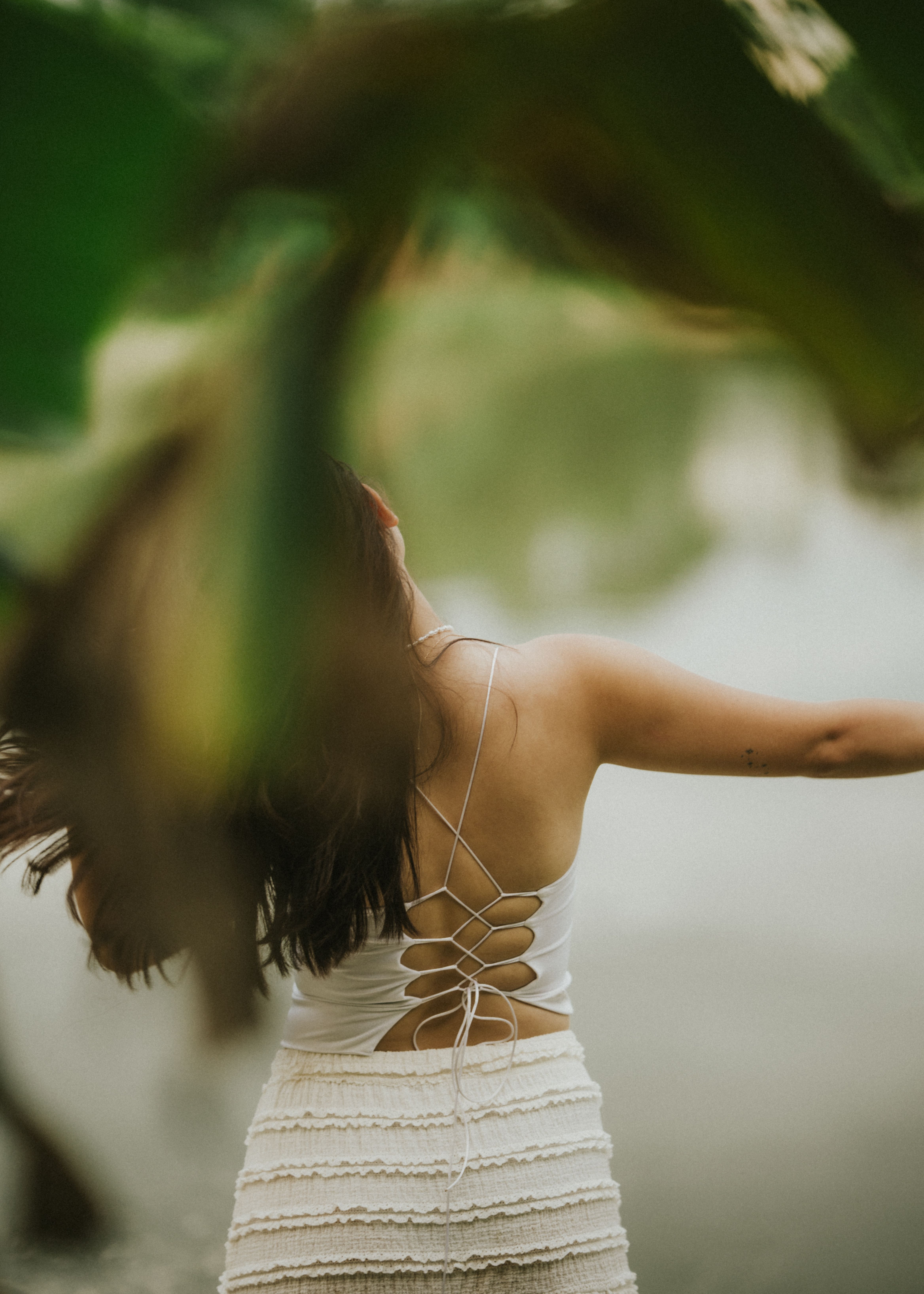 Serene Woman in Lace Dress by a Lake · Free Stock Photo