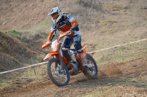 Free A thrilling enduro race scene featuring a motorcyclist navigating rugged terrain in Jihomoravský kraj, Česko. Stock Photo