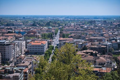 Free Aerial view of Bergamo, Lombardia showcasing historic buildings and vibrant urban landscape. Stock Photo