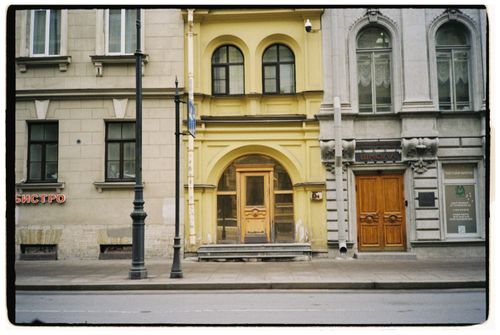 Free Classic European street view featuring vintage facades and colorful architecture. Stock Photo