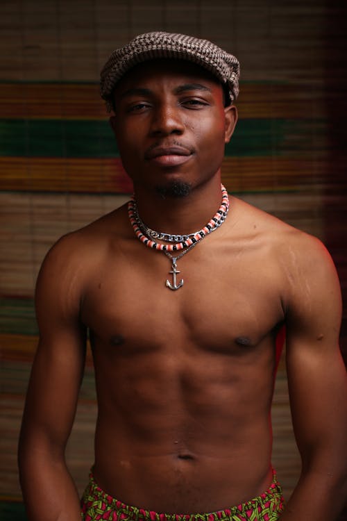 Topless Man Wearing Silver Necklace