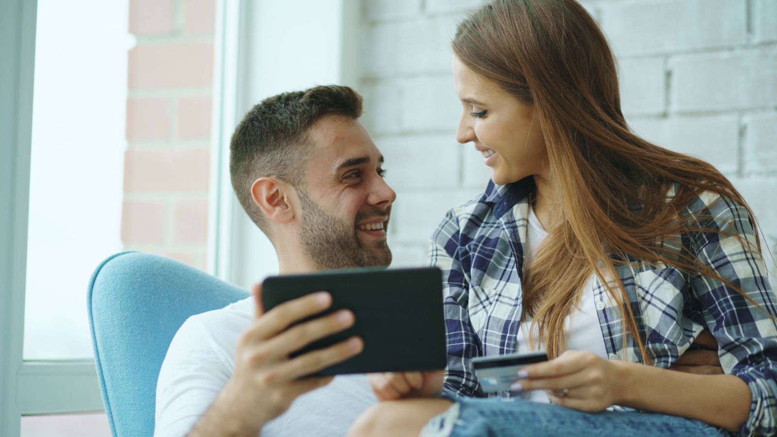 A couple reviewing finances together at home