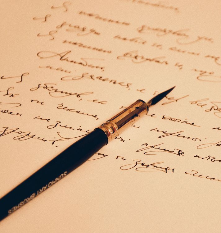 Vintage Calligraphy with Classic Ink Pen · Free Stock Photo