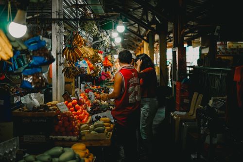 Free A bustling indoor market offering fresh fruits and vegetables, showcasing local culture and variety. Stock Photo