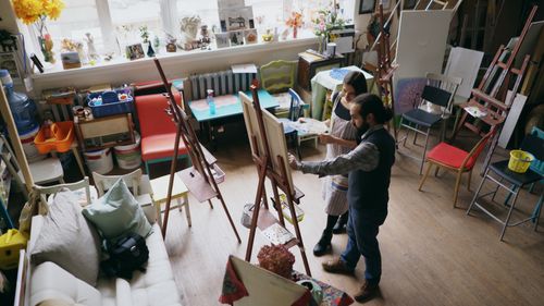 Local artist at opening reception