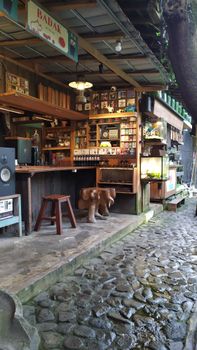 Explore the vintage charm of a cozy bar cafe in Jawa Barat, Indonesia with retro aesthetic.
