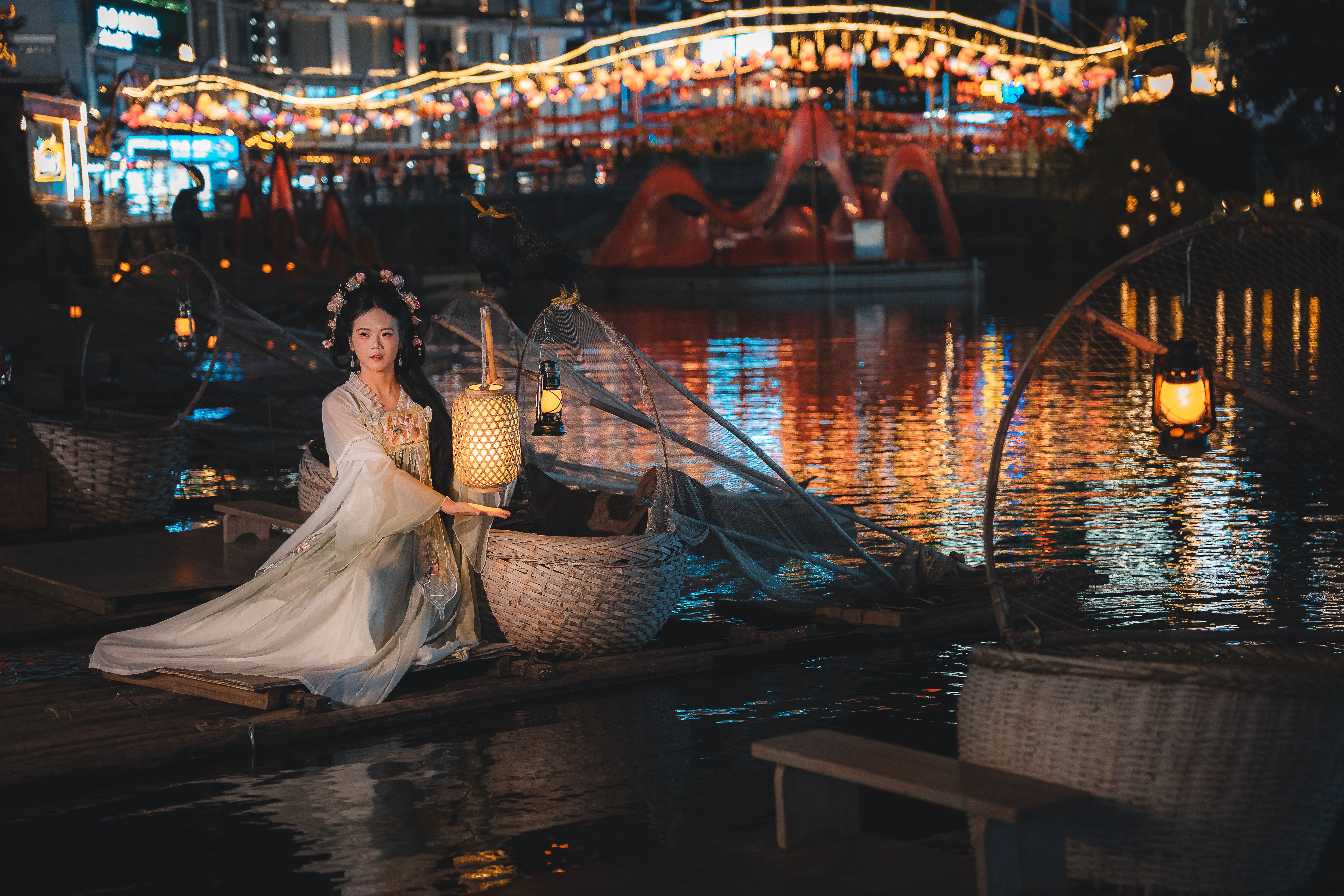 Traditional Chinese Woman Holding Lantern on Water · Free Stock Photo