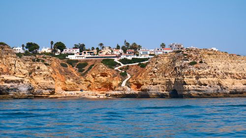Free Beautiful view of Algarve coastline with cliffs and blue ocean in Faro, Portugal. Stock Photo