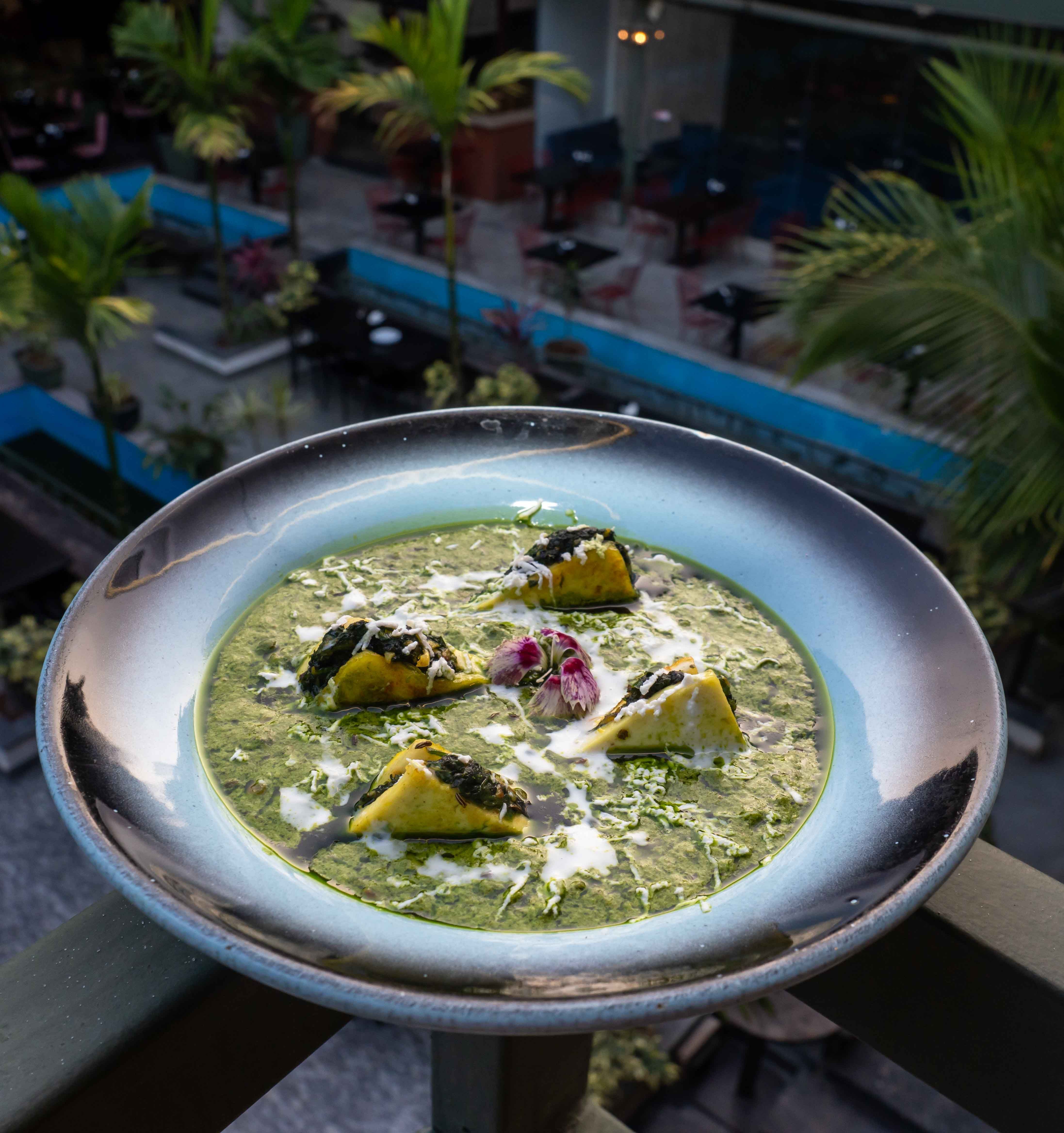 Firm paneer cheese simmered in a pureed, spiced spinach sauce.