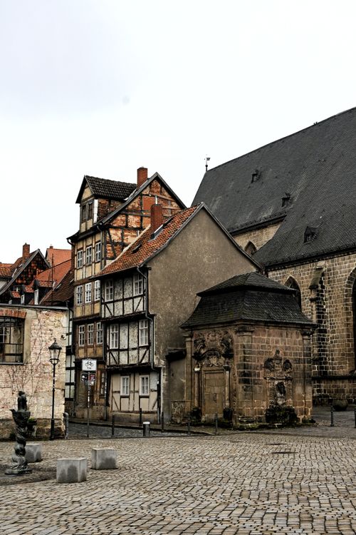 Free Charming cobblestone street with medieval half-timbered houses in Quedlinburg, Germany. Stock Photo