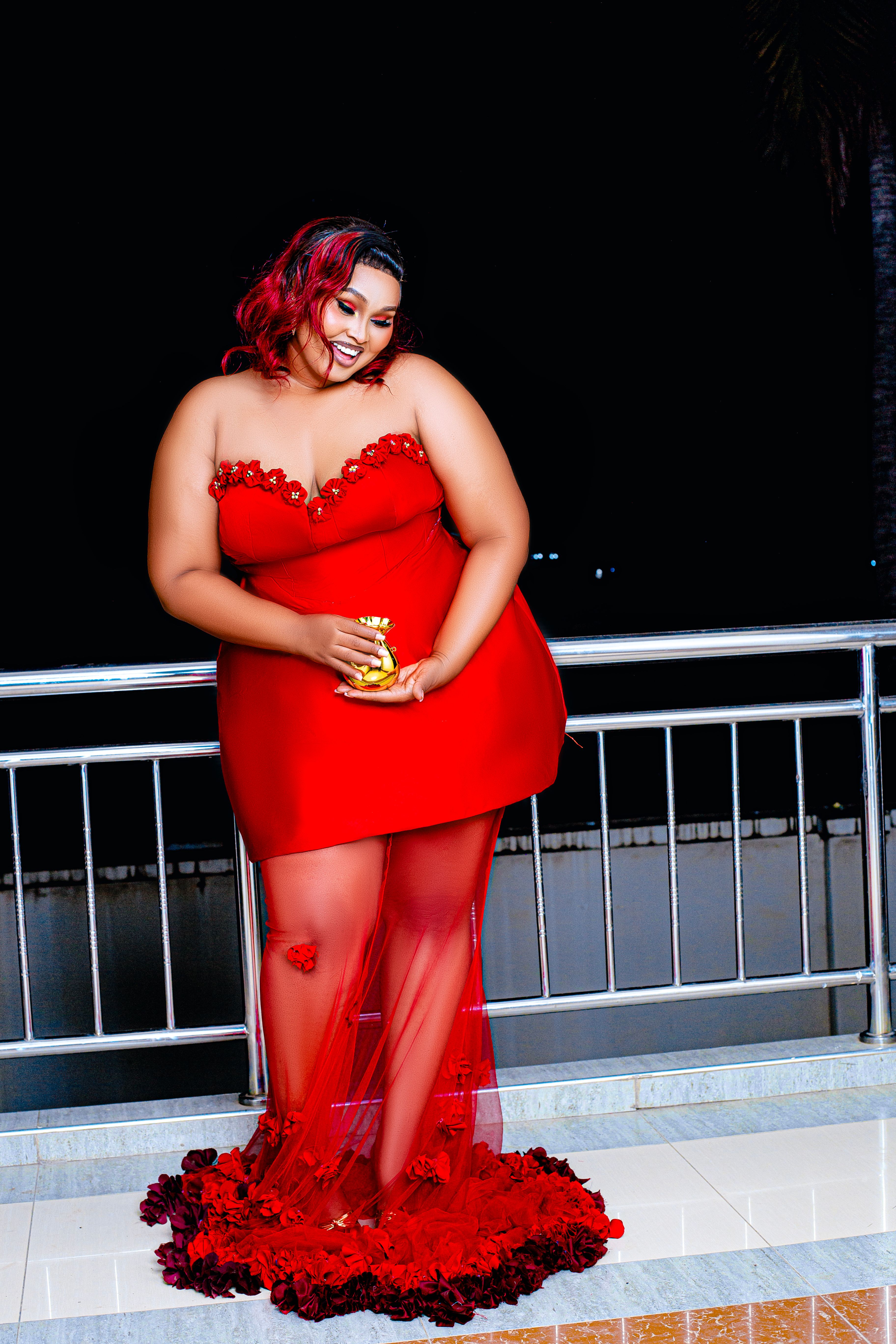 Elegant Woman in Red Gown at Night · Free Stock Photo