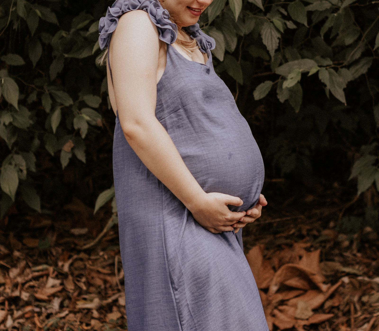 Expectant mother outdoors