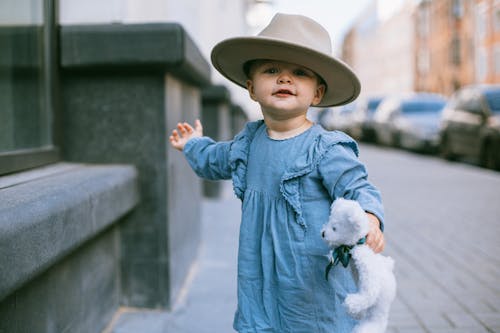 Shallow Focus Photo of Baby Wearing Hat