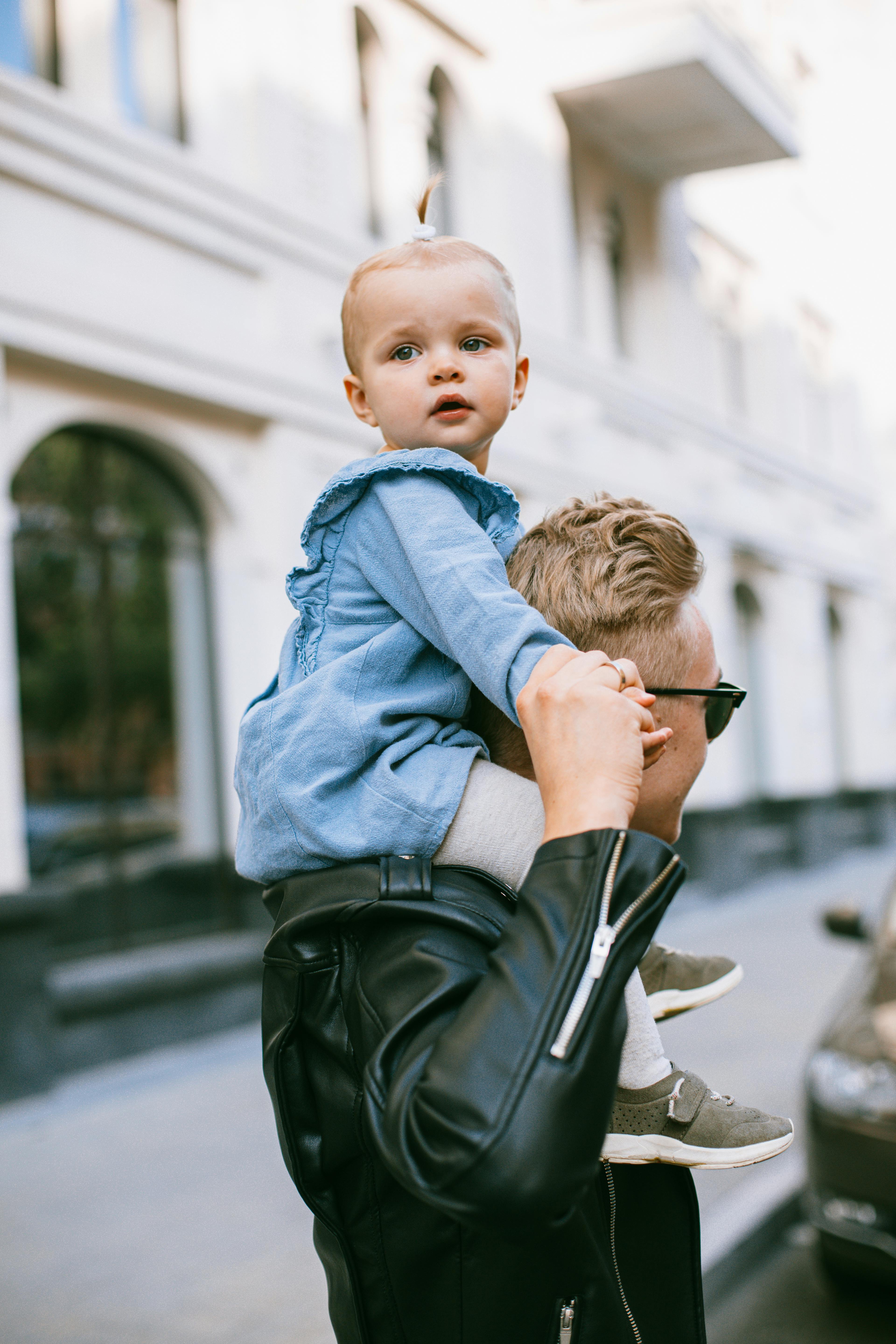 carrying baby on shoulders