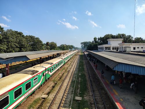 Free Aerial view of an intercity train at a station in Feni, Bangladesh, on a sunny day. Stock Photo