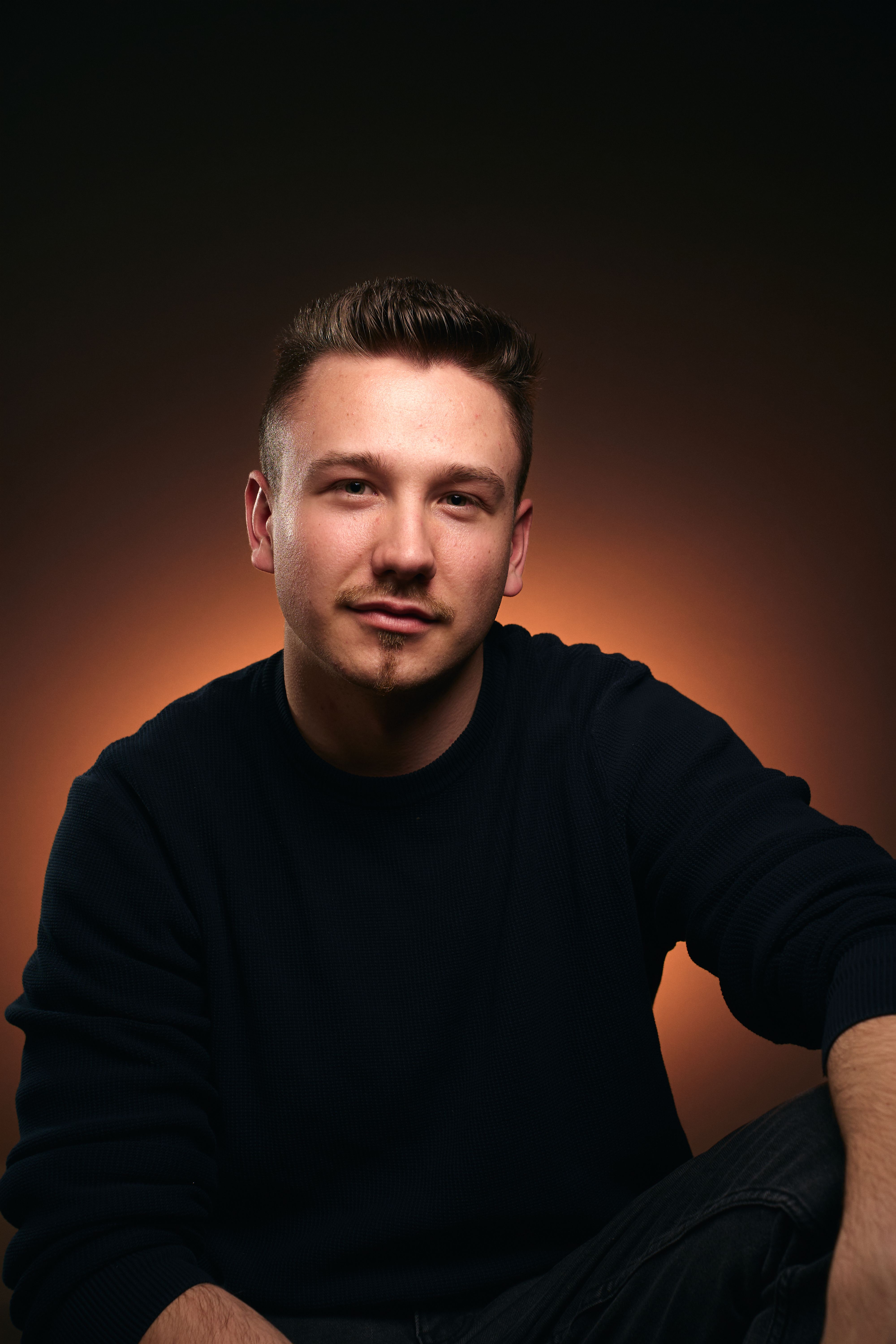 Northline studio portrait in warm light