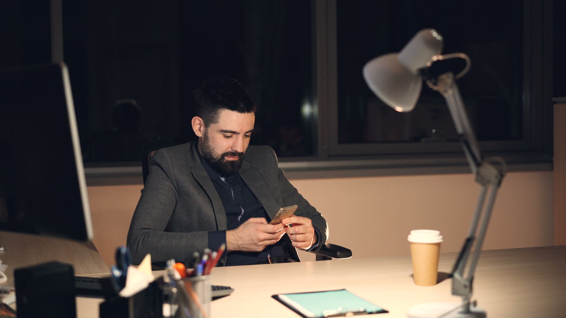 entrepreneur working late night on sales strategy