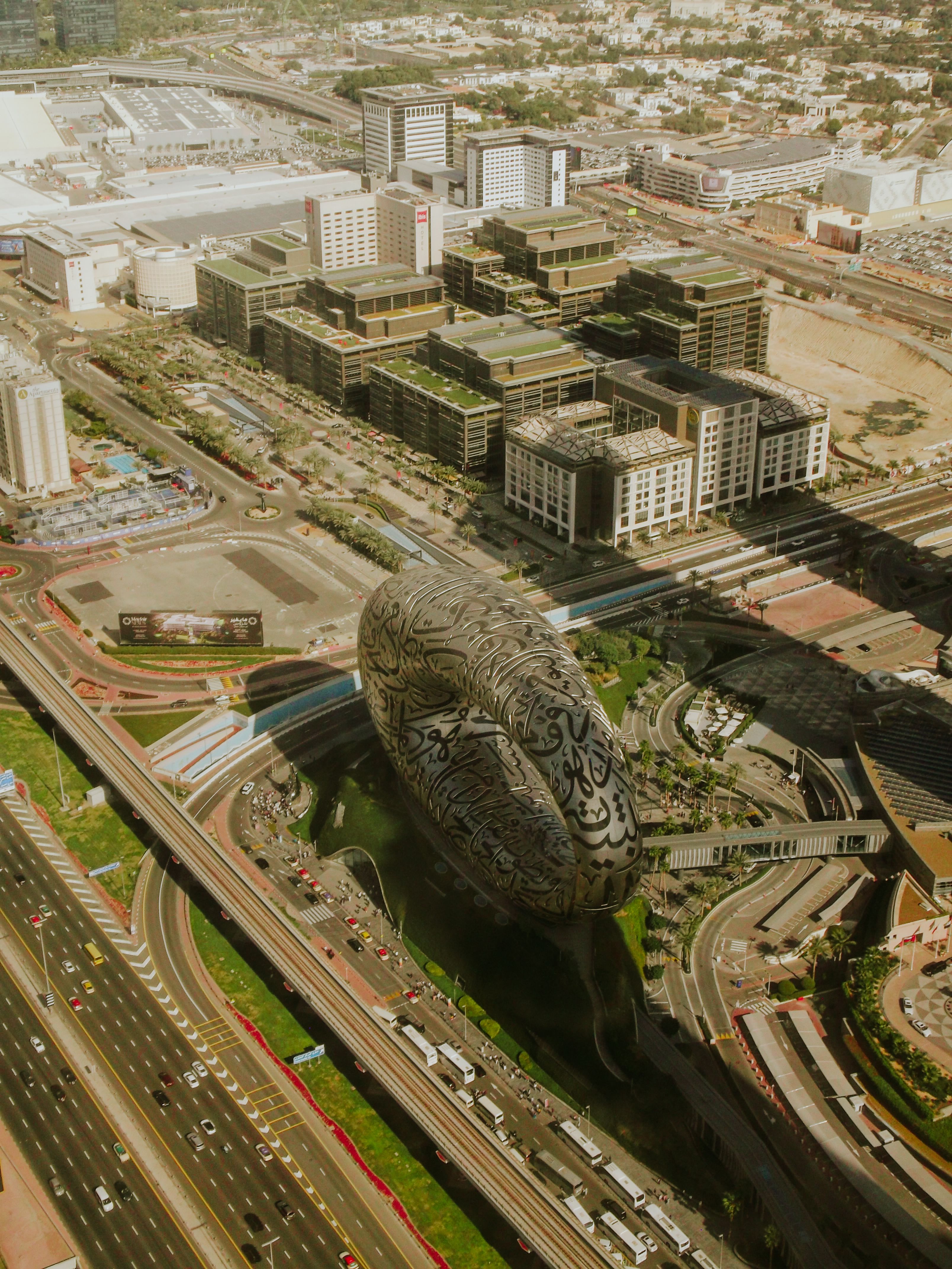 Stunning aerial view of the Museum of the Future in Dubai, showcasing modern architecture and urban landscape.