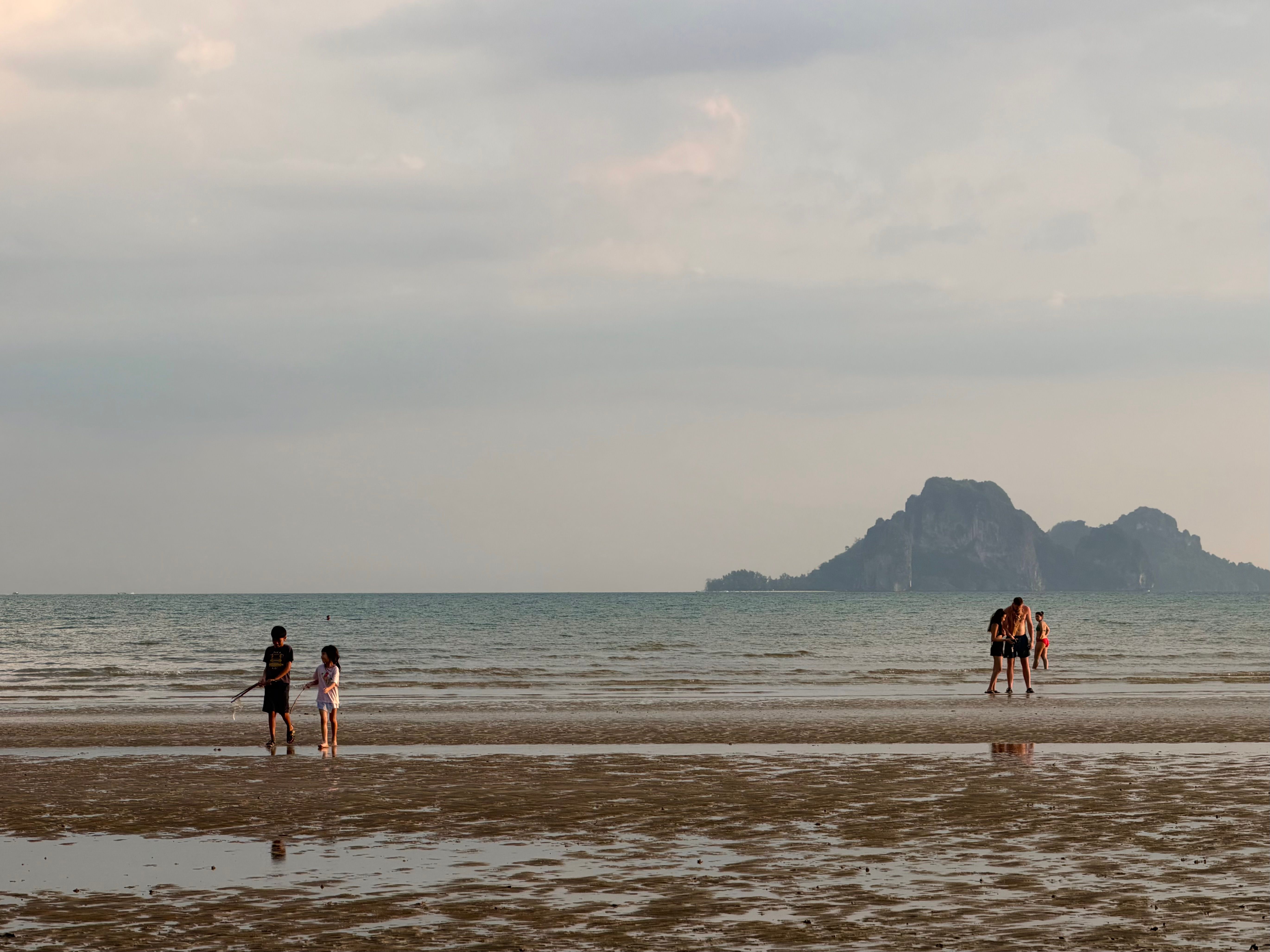Peaceful sunset walk along Samila Beach in Songkhla, southern Thailand