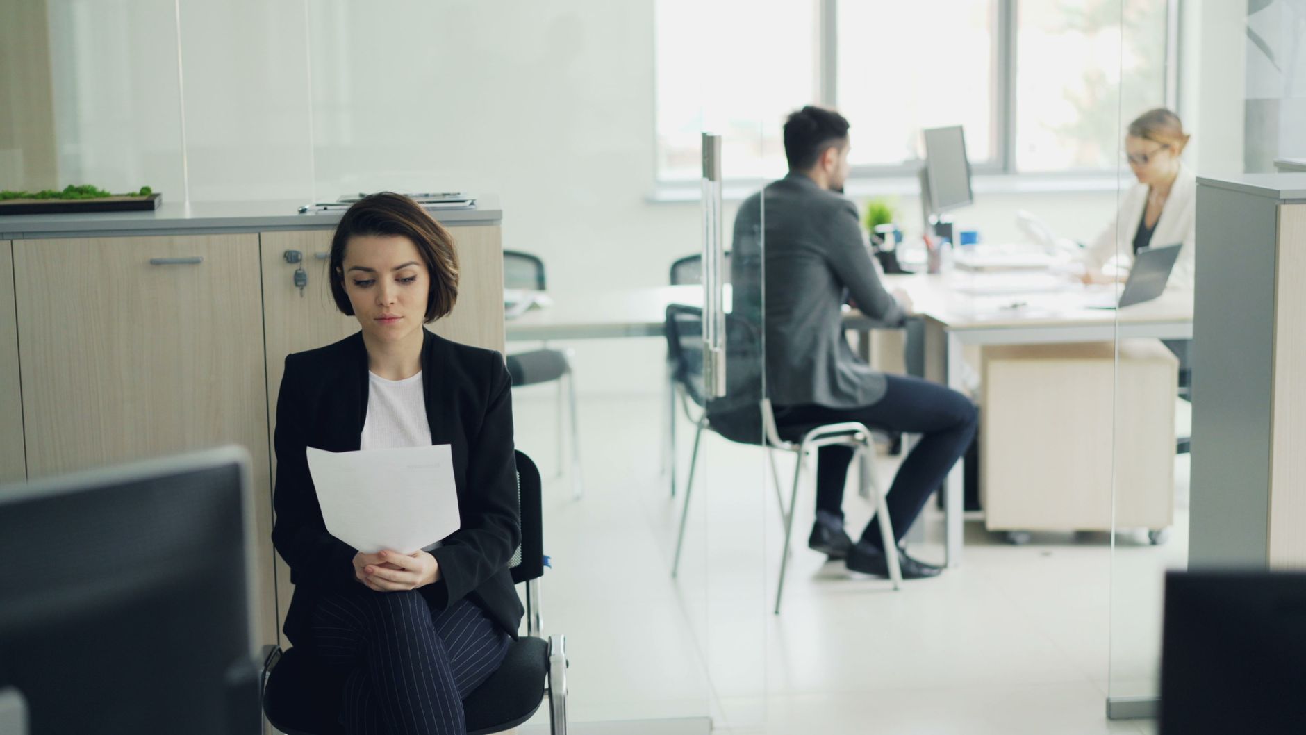 Editorial photo for Can I Sue Employer for Discrimination, showing employment records and workplace documents.