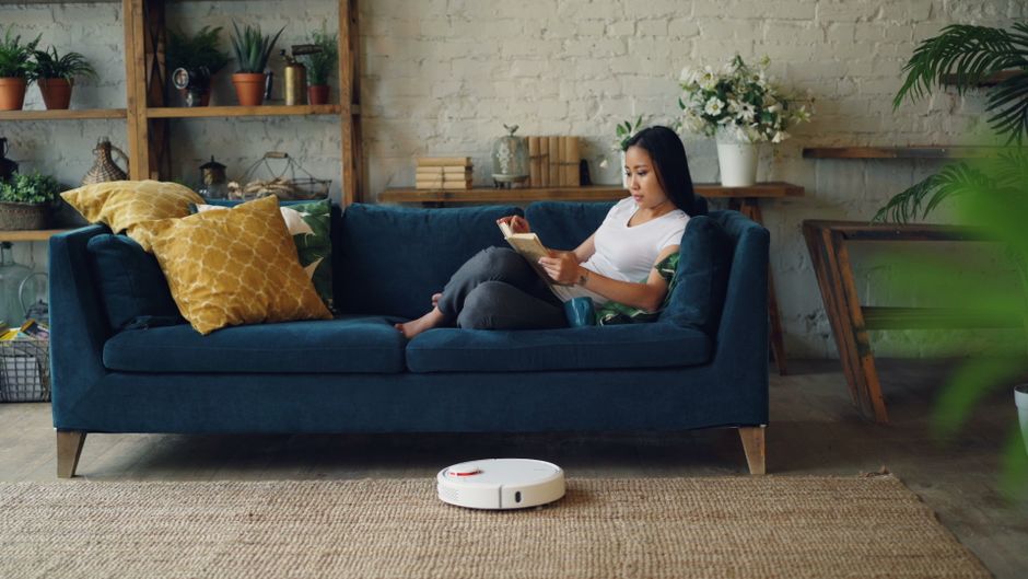 robot vacuum cleaner in living room