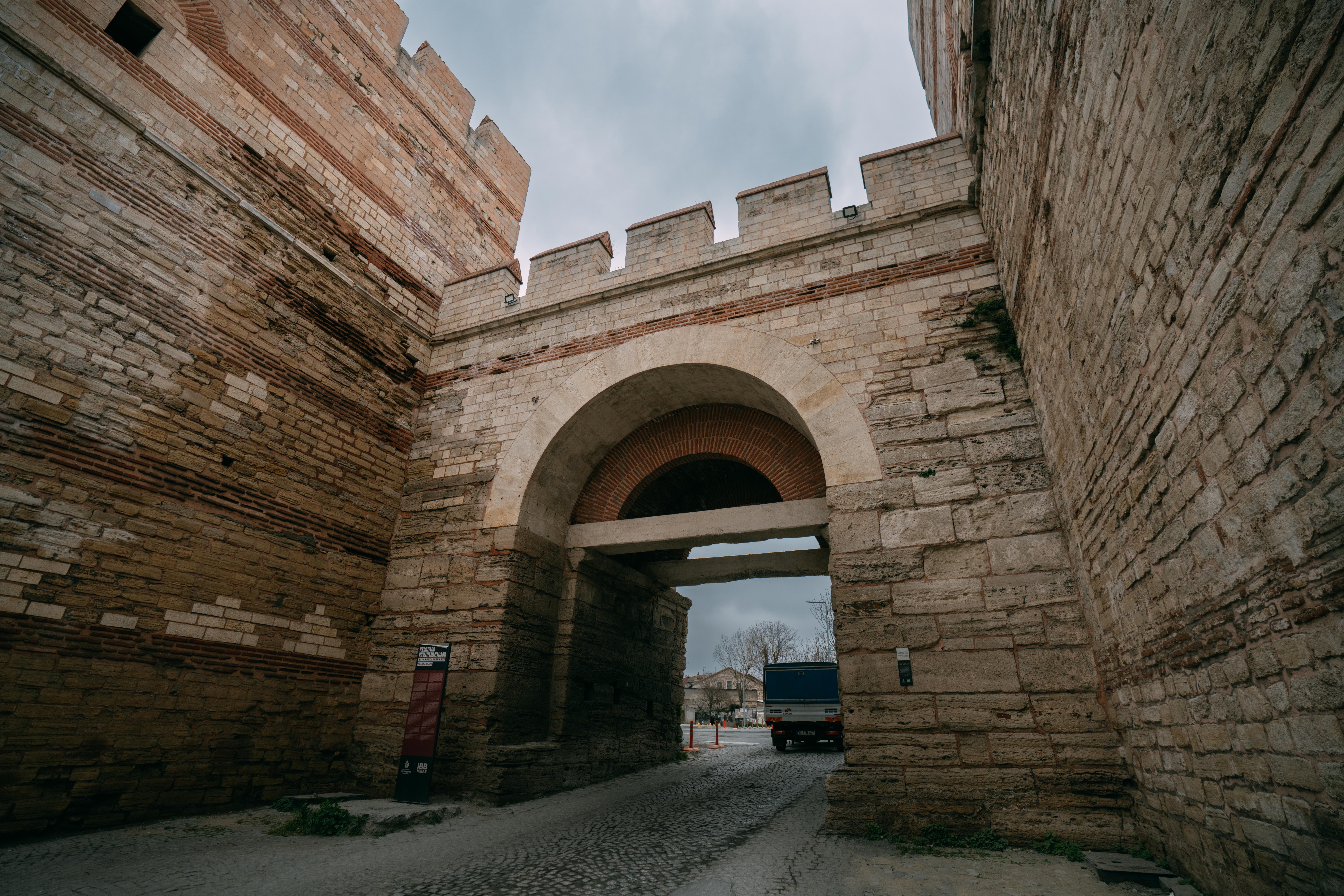 Historic Stone Fortress Gate in Overcast Weather · Free Stock Photo